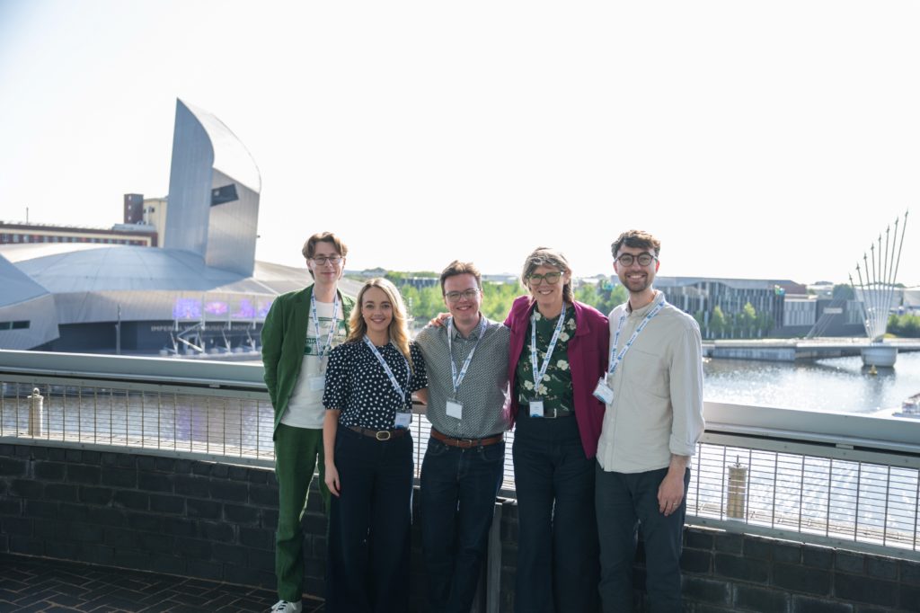 The Digital Skills Education team standing on the roof of the Lowry centre in Salford