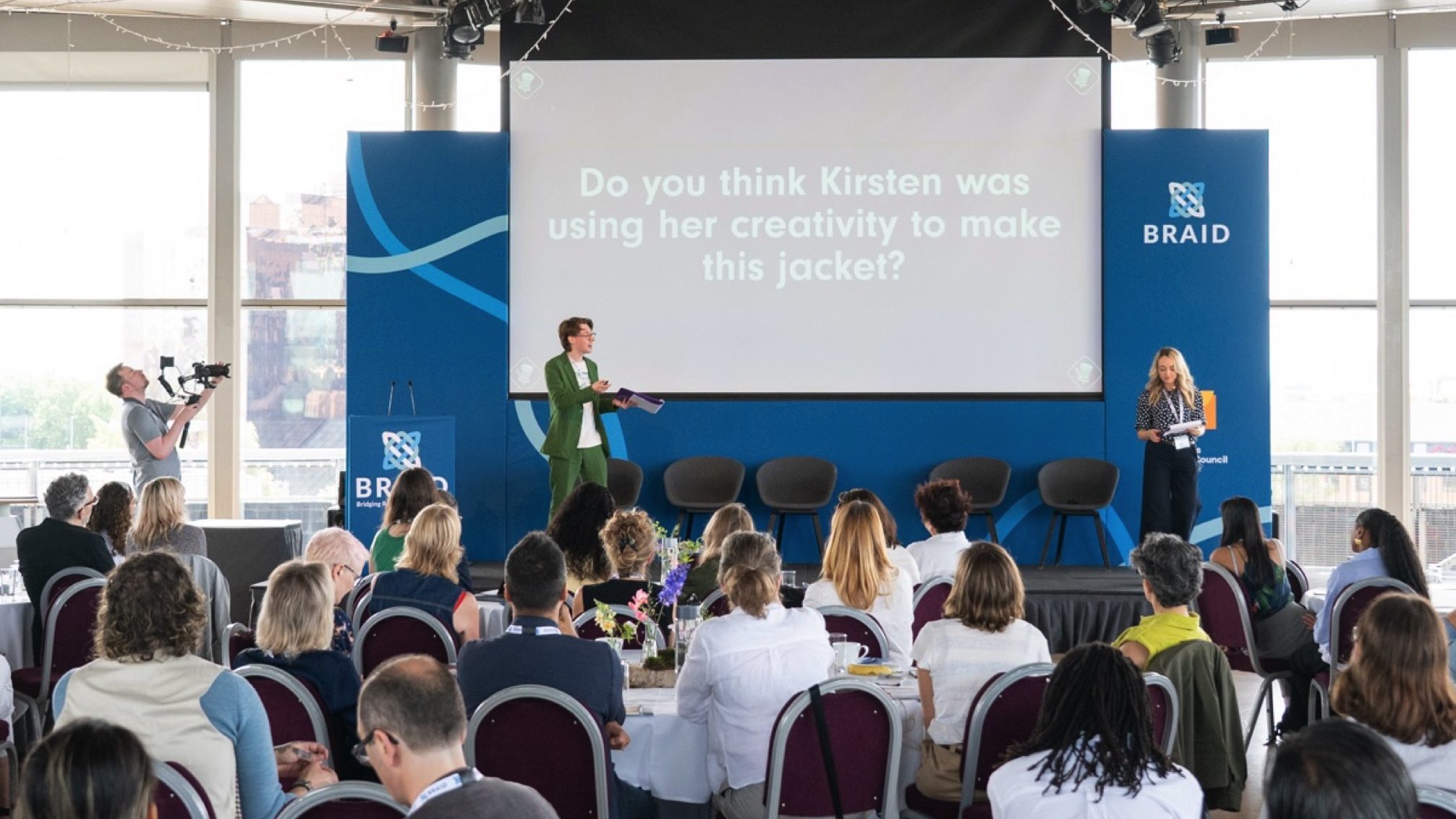 Daniel and Kirstie present on stage